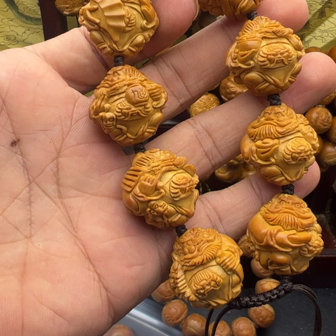 赵***文吊坠橄榄核2.4正圆龙钟馗