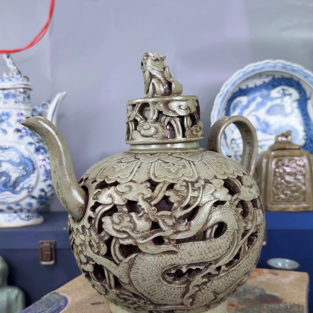 普***洱摆件越窑镂空龙纹壶五代