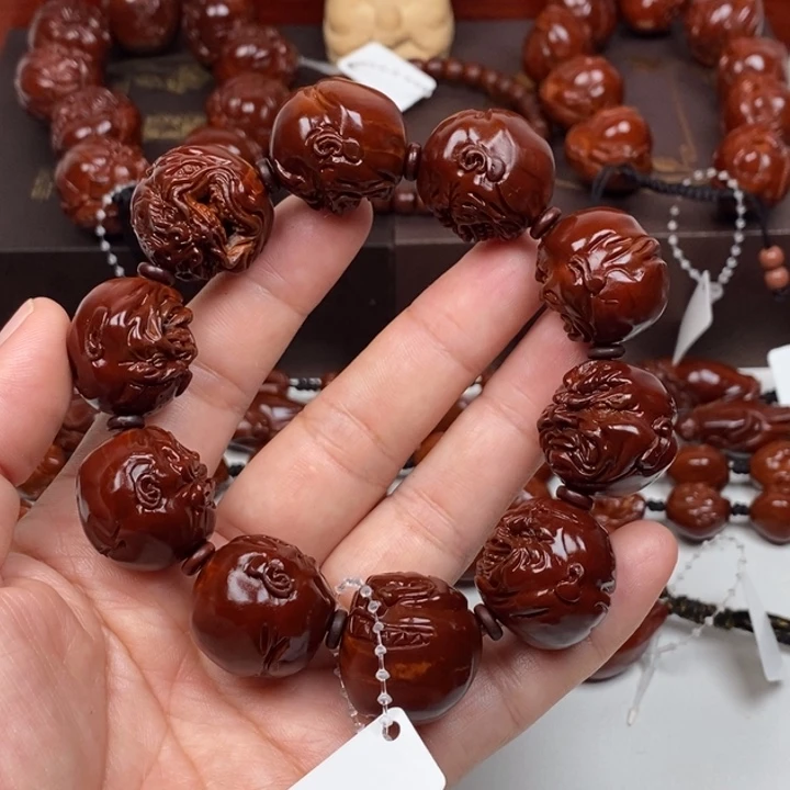 橄榄核吊坠刘*-8877766555