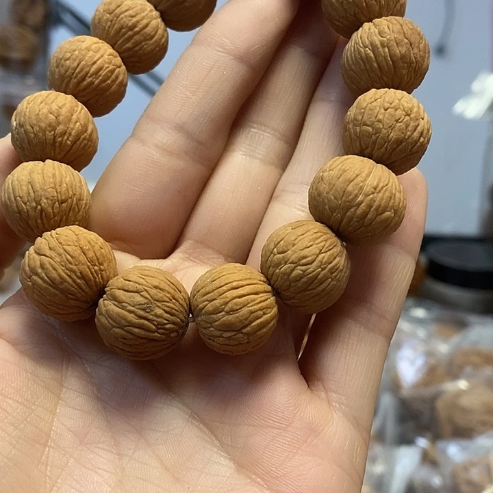 把件文玩核桃凤羽手串