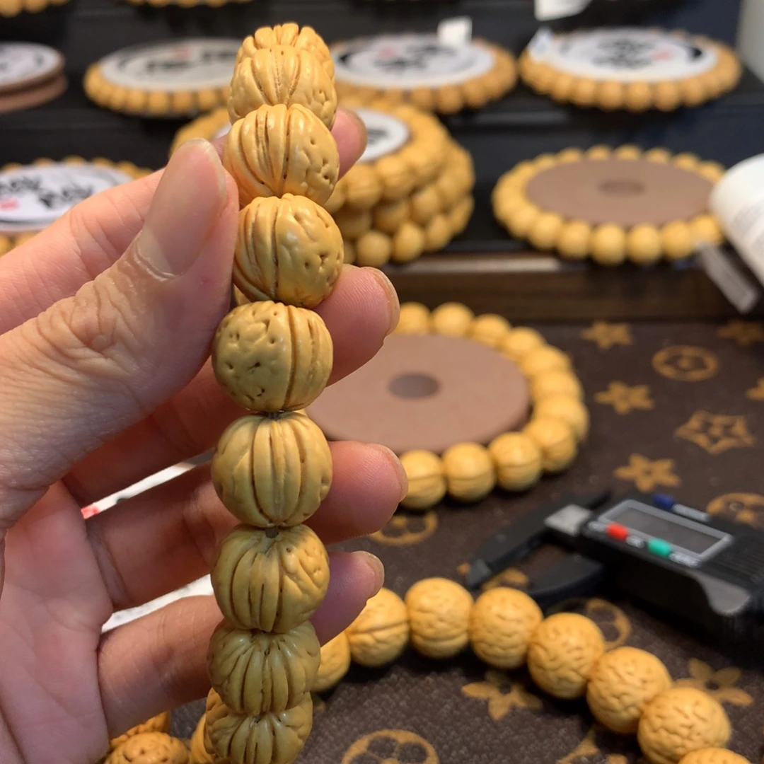 精品桃核金丹手串