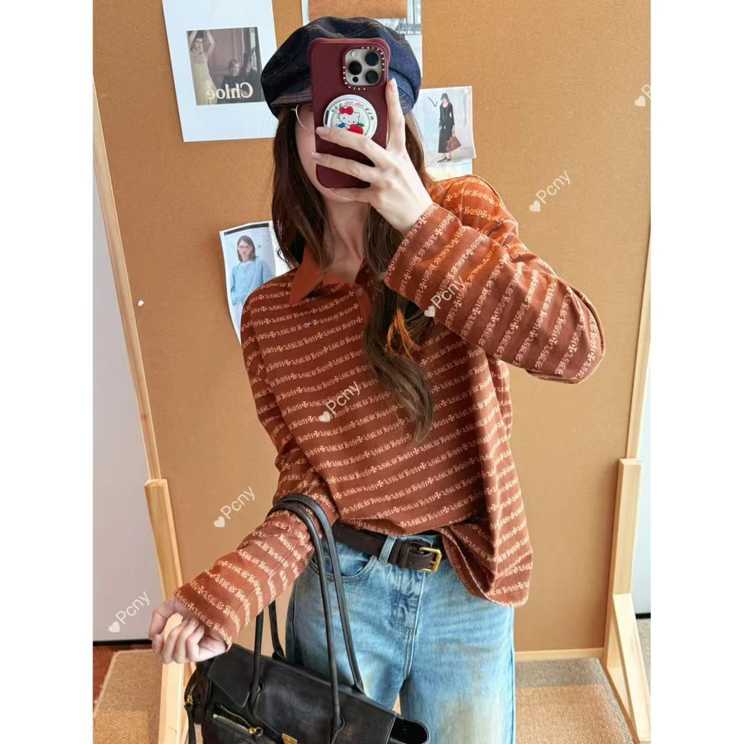 PCNY「焦糖织语」不理理冬季新款女装时尚休闲梵文条纹长袖T恤