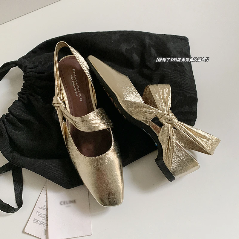 864/羊皮蝴蝶扭结可两穿包头凉鞋