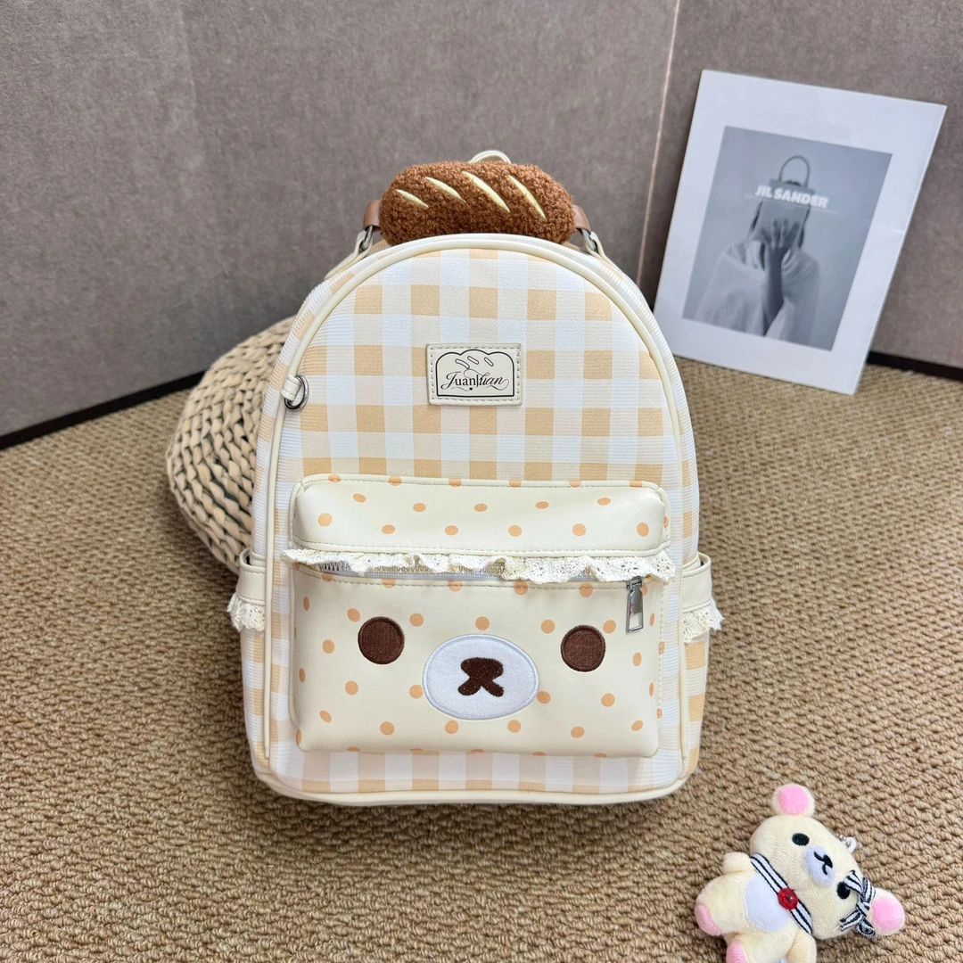 可爱奶黄格纹轻松熊印花大容量学生通勤双肩包