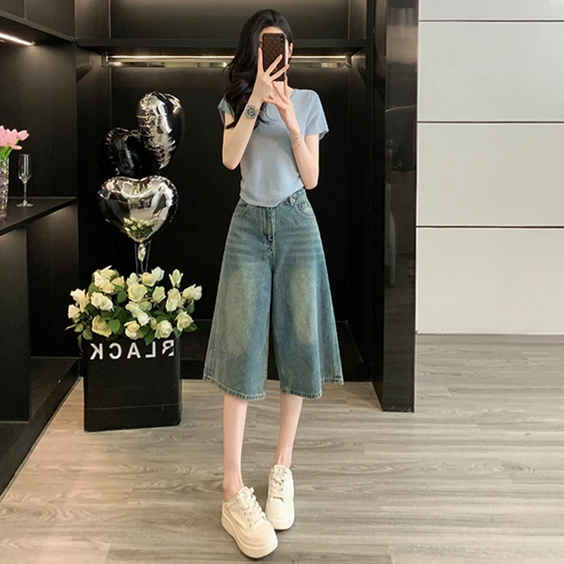 设计感小众时尚运动休闲套装女夏新款圆领背镂空短袖牛仔裤两件套