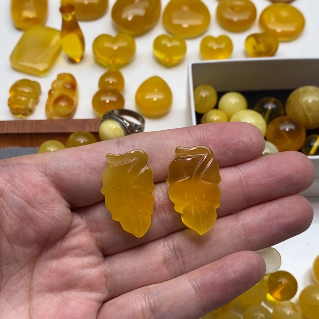 浪***花裸石琥珀未镶嵌一对叶子