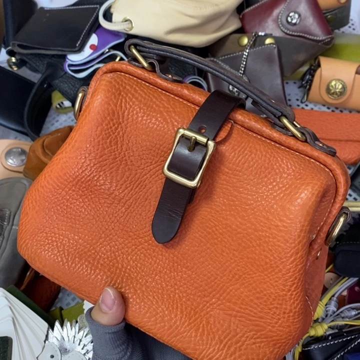 头层牛皮瑕疵单肩包