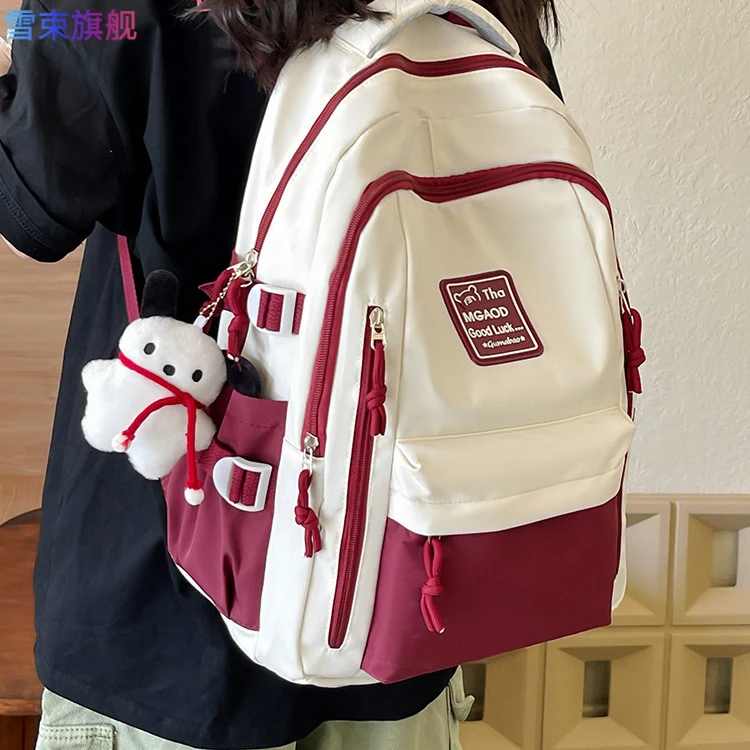 学生书包2025新款撞色高级感双肩包大容量多兜休闲背包百搭少女