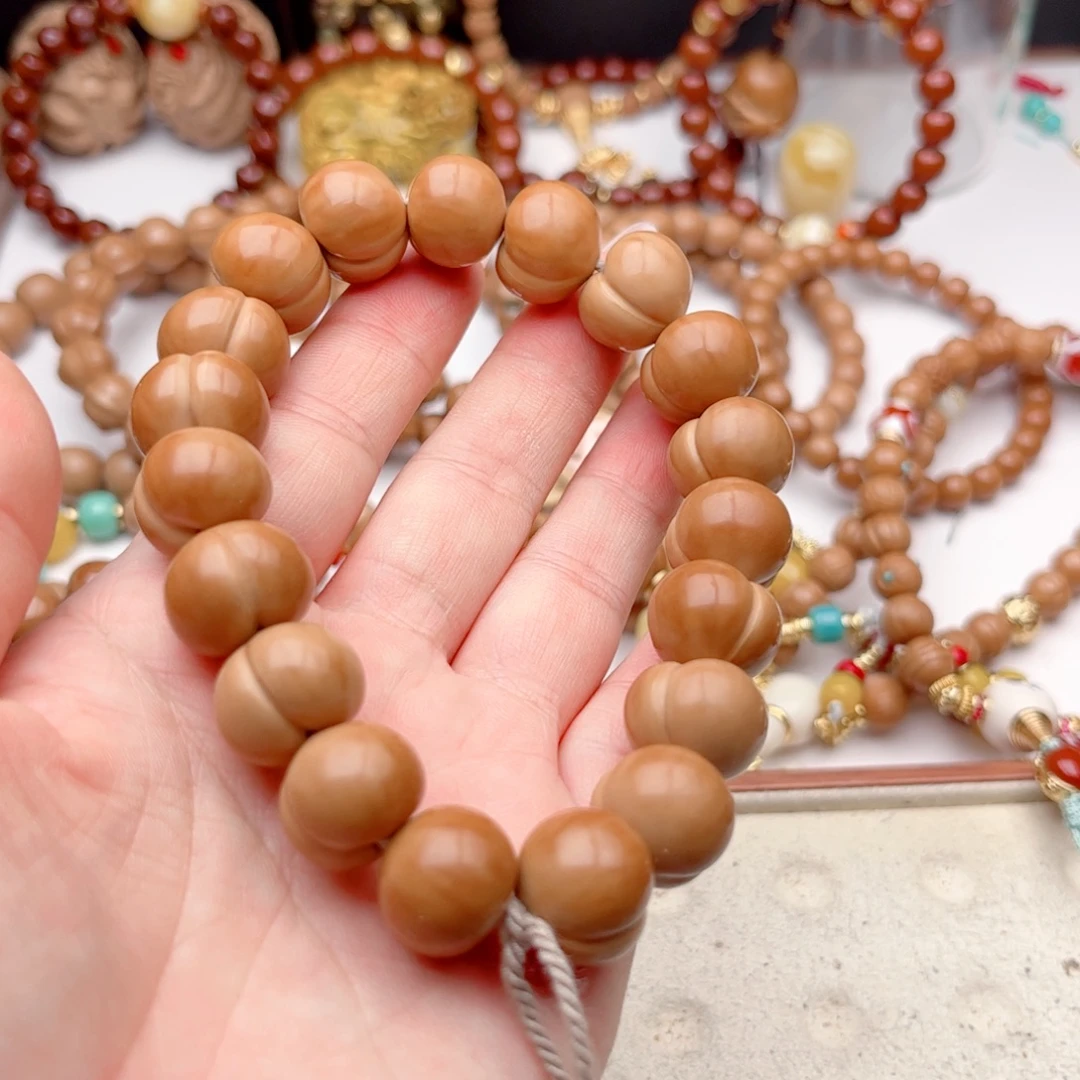 @***猴头核桃吊坠屁桃