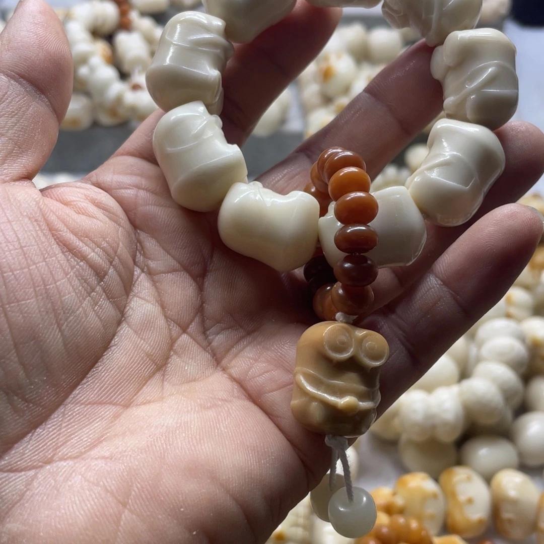 吊坠菩提根/象牙果全品象牙果小黄人手串卡23