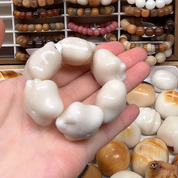 白玉菩提把件1.19.54象牙果原果蝴蝶结星星
