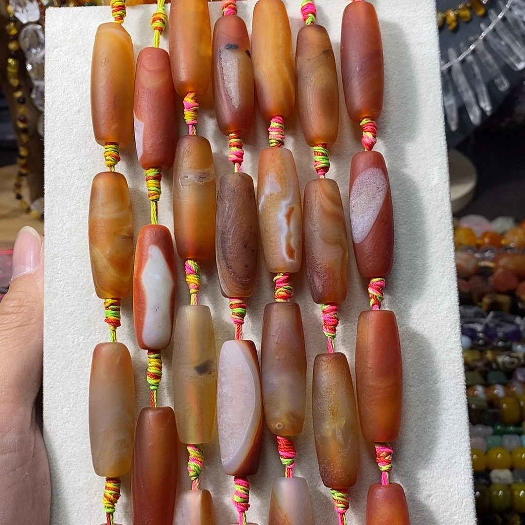 石英质玉未镶嵌，橘皮老玛瑙天珠14×39mm一条，大孔，