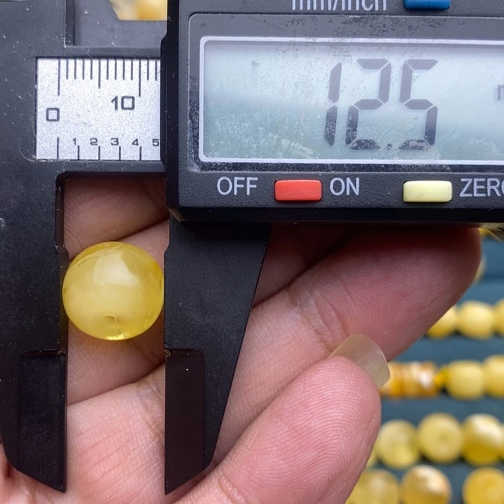 琥珀未镶嵌裸石19号12.5*9.7喇叭口微瑕