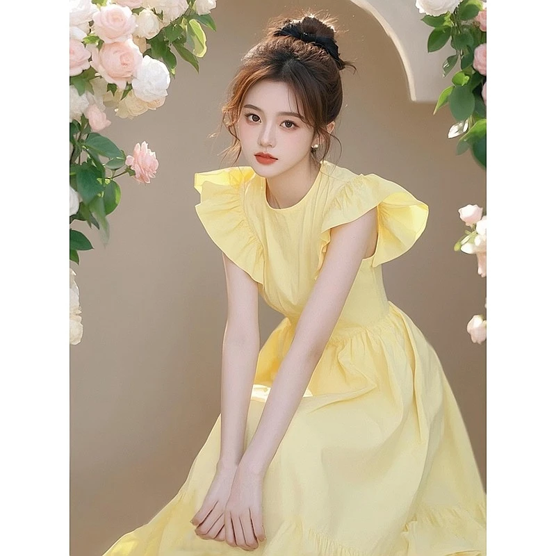 海边度假黄色小飞袖连衣裙2025独特超好看夏装多巴胺气质绝美裙子