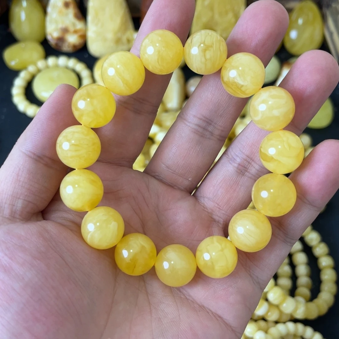 琥珀未镶嵌手串14+俄料黄白妖花圆珠手串（微瑕）