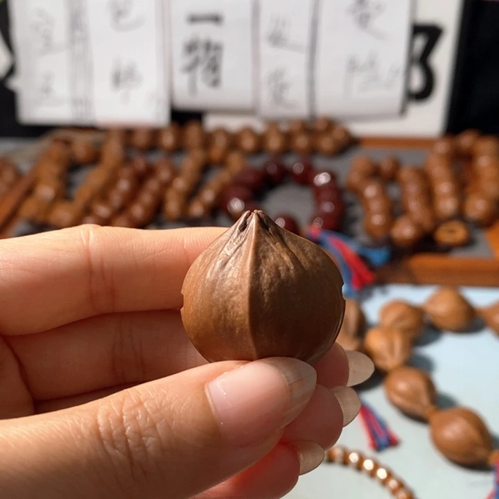 愉***悦手串橄榄核28精品4花3通