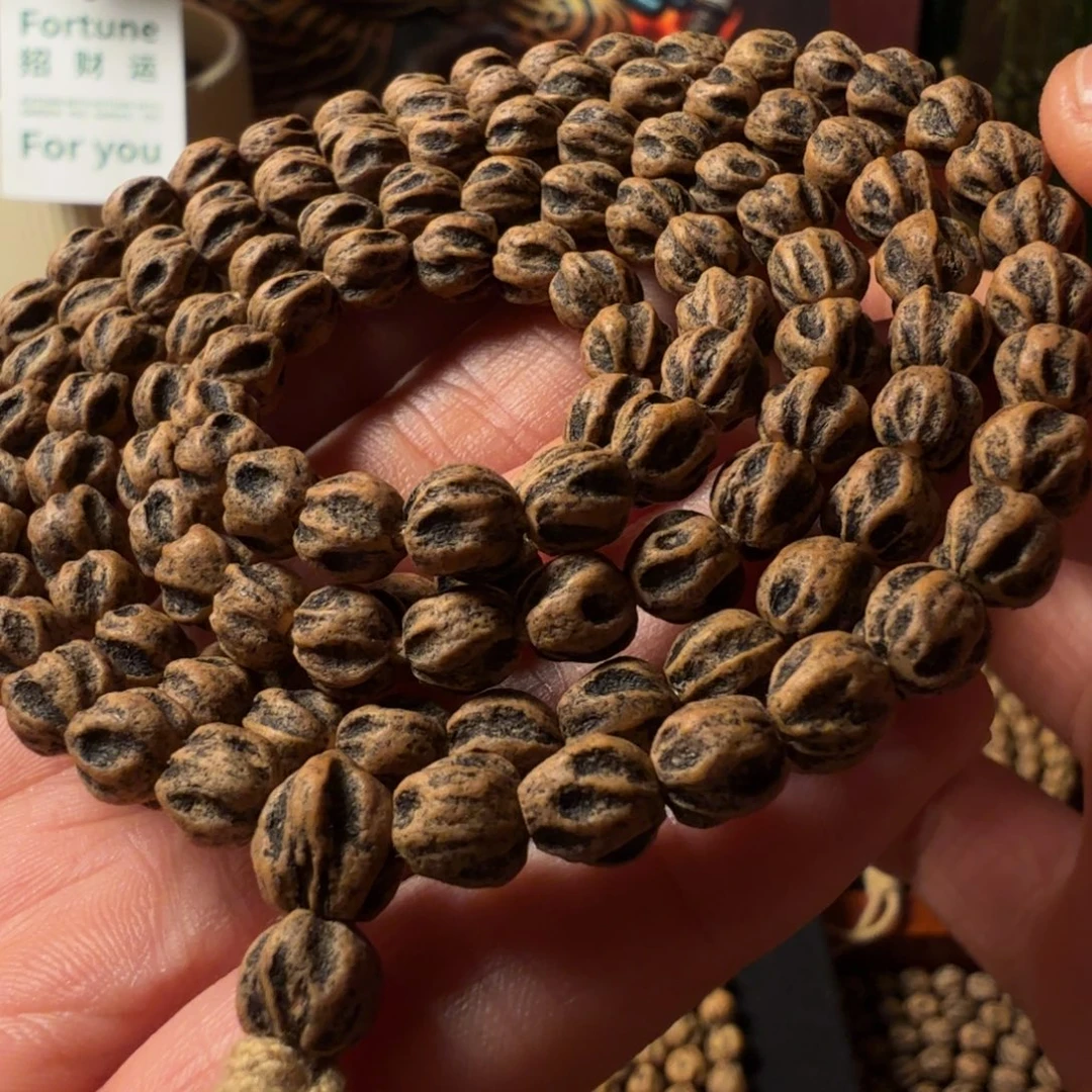 啤***姐吊坠柏香籽/百香籽