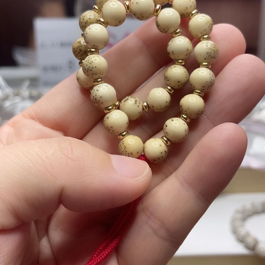 吊坠星月菩提8圆石玉同枝河豚细星奶黄手持