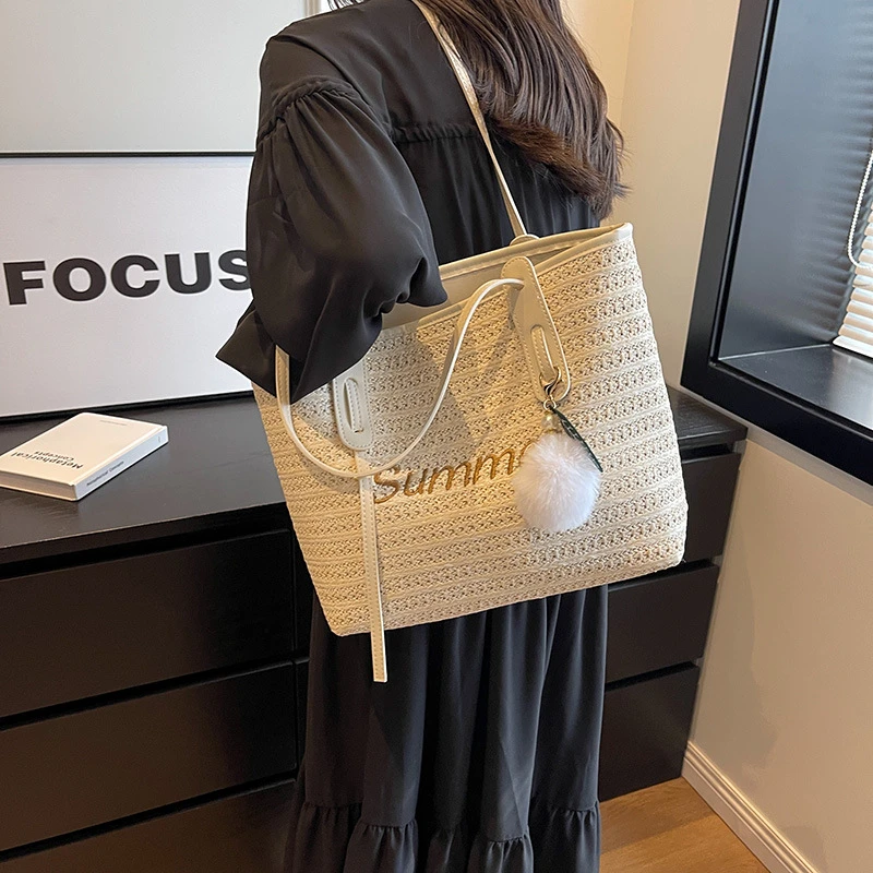 通勤编织包包2025新款小众网红爆款托特包女大容量单肩大包草编包