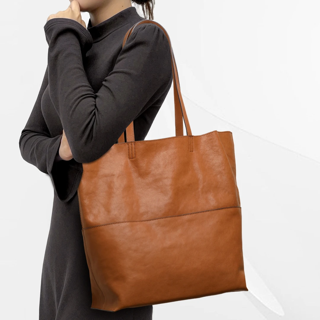 CCAMO网红款水桶包包女款爆款2025新款单肩包女大容量真牛皮女包