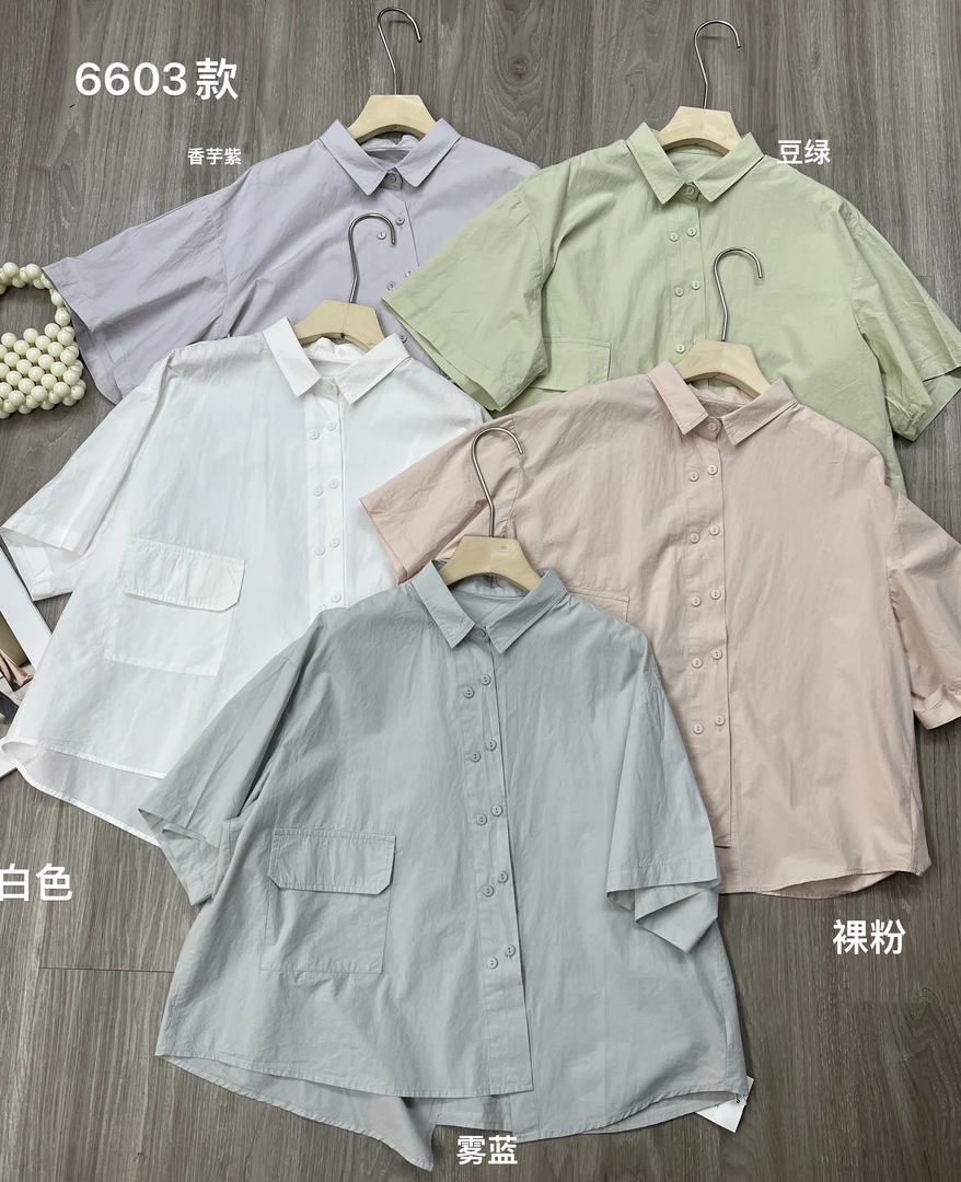 复古文艺斜门禁分割拼接短袖衬衫女设计感气质口袋宽松衬衣新品