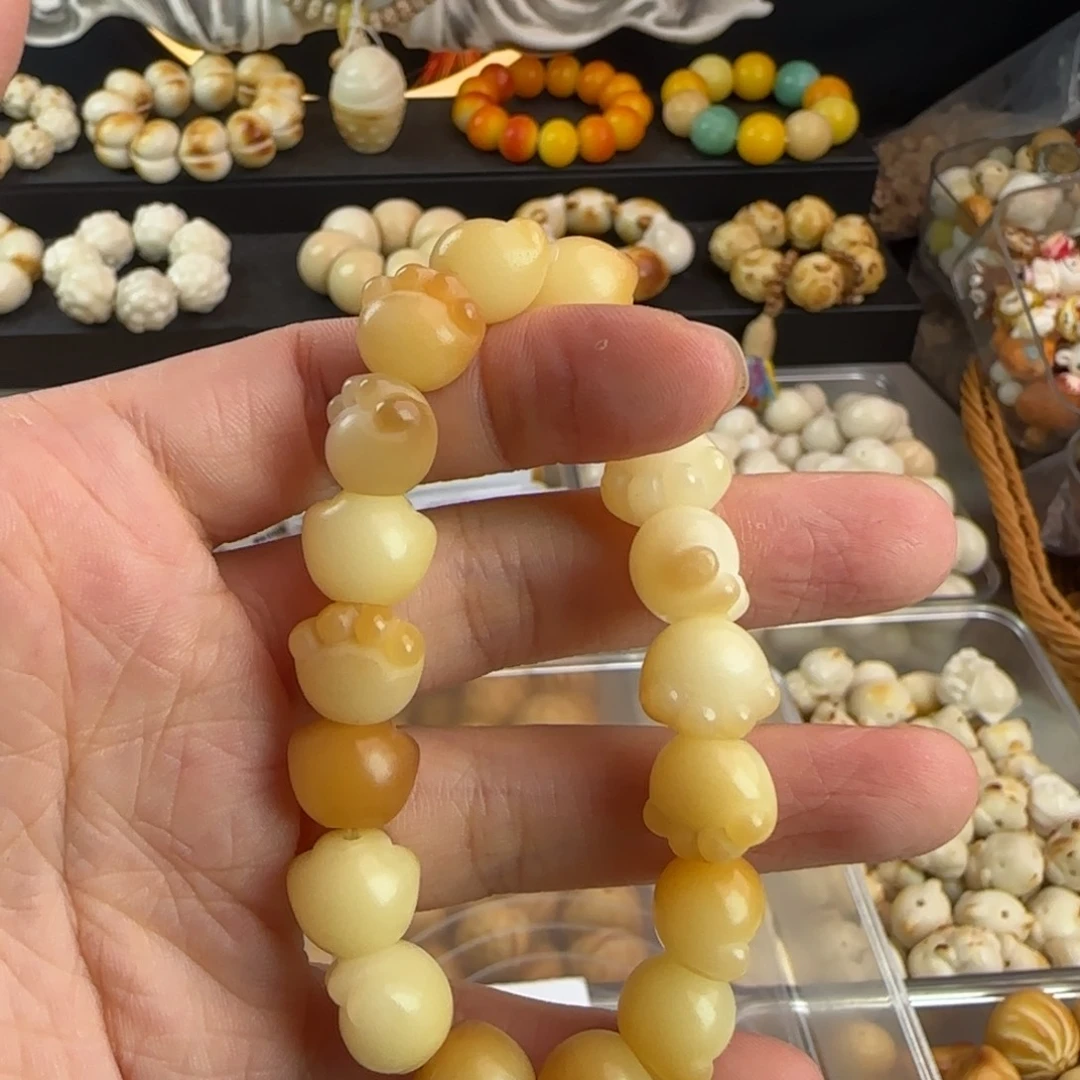 菩提根/象牙果手串卡12奶黄猫爪1串