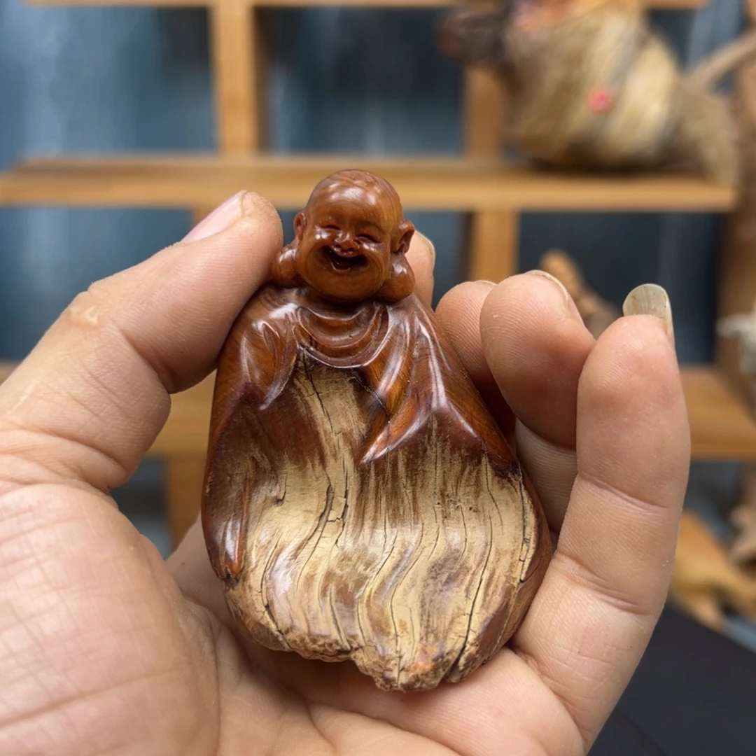 木一****）崖柏木摆件手把件