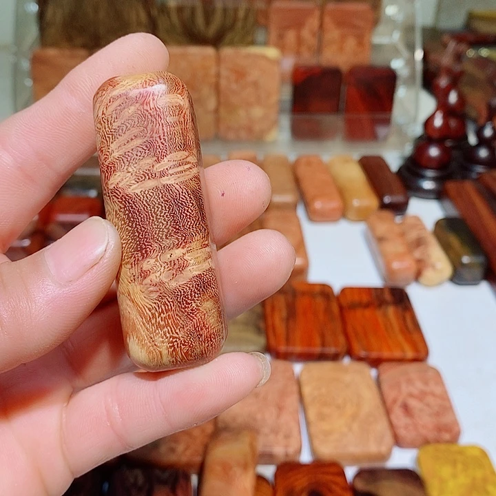 天***色香榧木羊蹄甲手把件58555