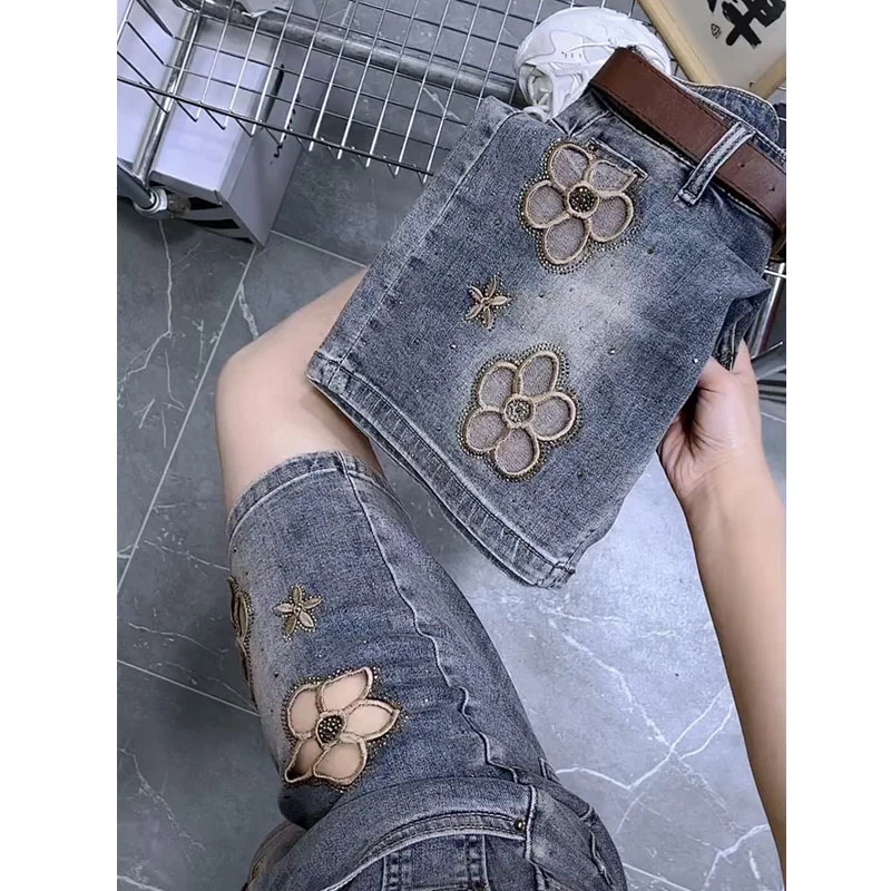 夏季薄款高腰弹力镂空刺绣牛仔短裤女大码宽松显瘦直筒中裤五分裤