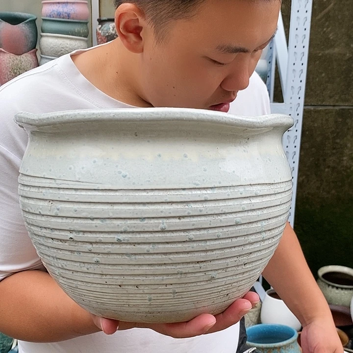 紫砂花盆口25高18瑕疵