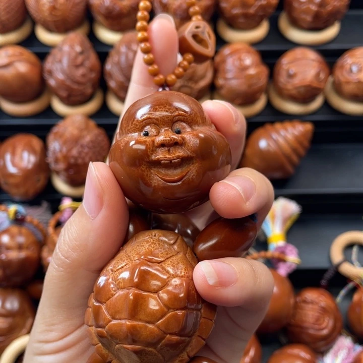 橄榄核手串/手链富贵鬼脸圆珠四肢加红珠全体棕线