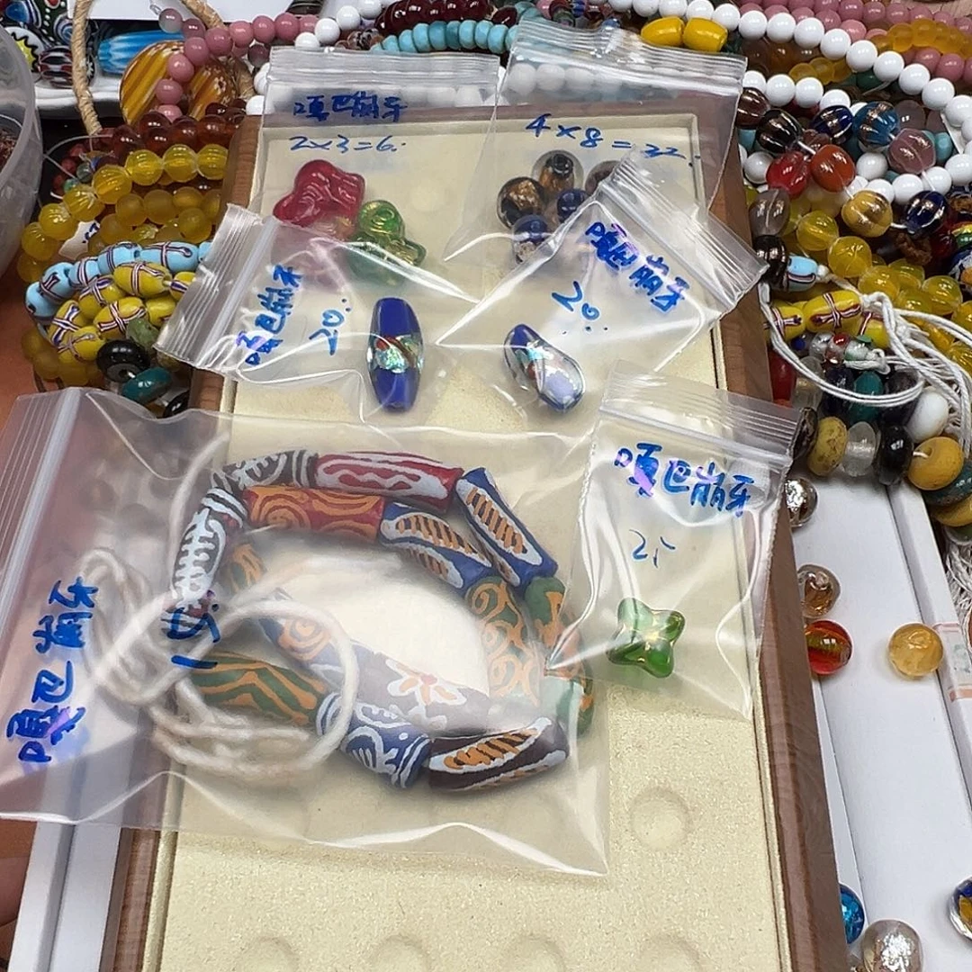 嘎***牙琉璃非金属嘎巴崩牙的琉璃花珠