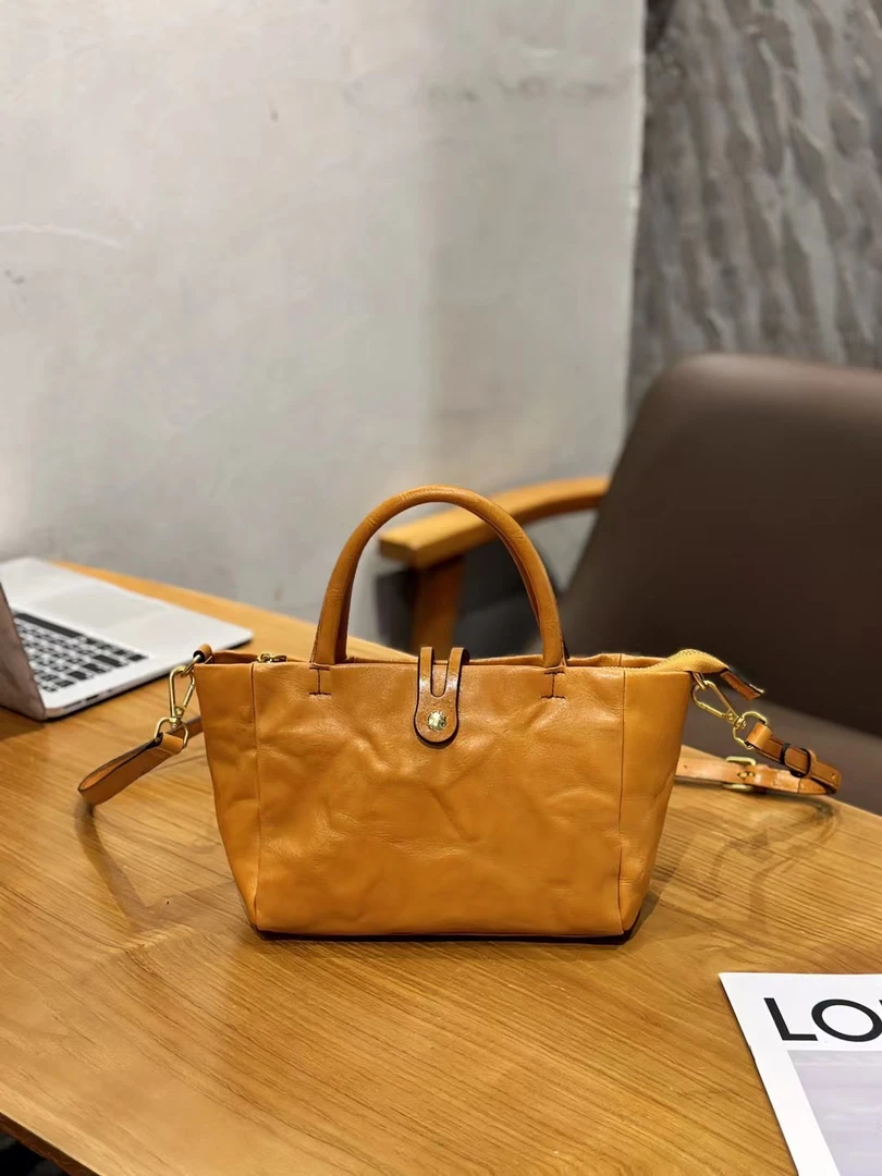 手抓纹真皮手提斜挎两用女士包