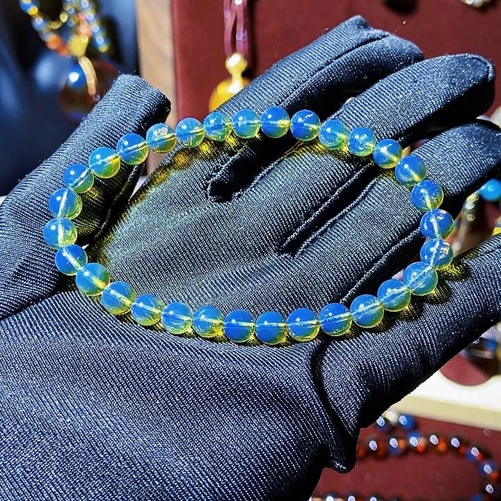 蓝珀珠宝奇石未镶嵌蓝珀异色紫6mm净水