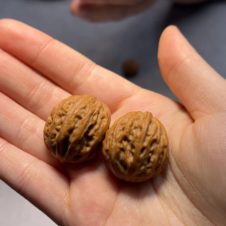 文玩核桃把件拿****?半壁649