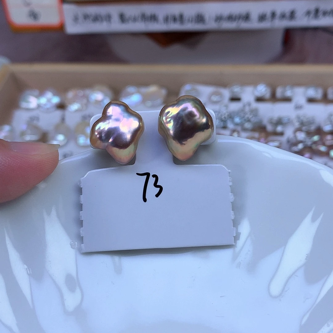 啄***店耳钉淡水珍珠合金精品73拍2个