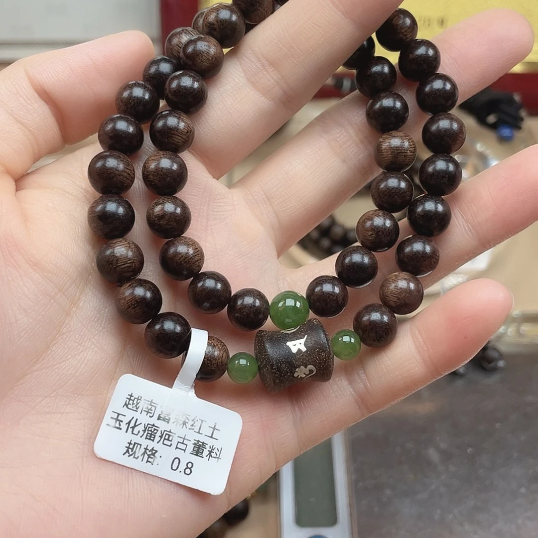 沉香碎屑沉香越南富森红土玉化瘤疤古董料0.8