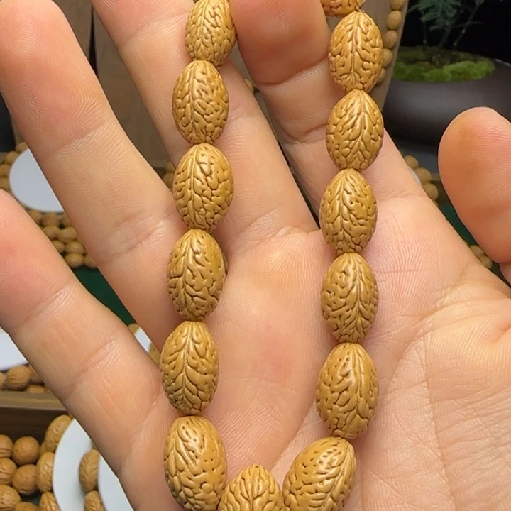 风***起手串桃核麦穗钱袋子手持