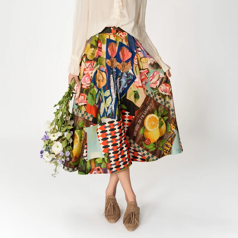 谜底花色半身裙2025春季新品度假风原创印花中长款半裙251MB5002