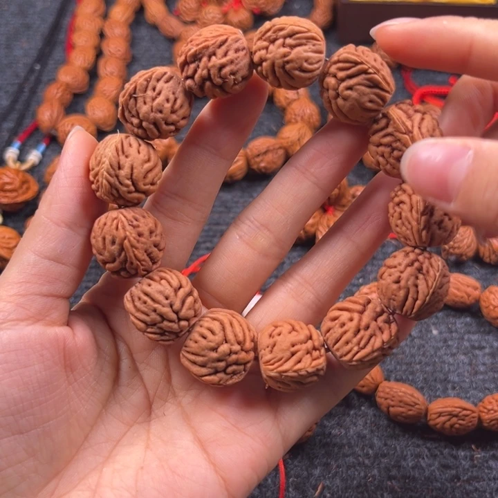 蓉***桃核吊坠桃枭手串L2