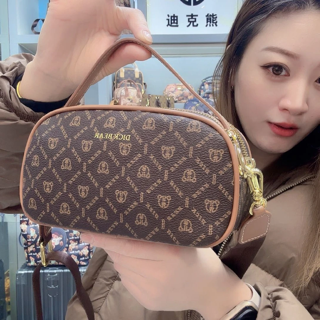 PVC9849雄心咖手提斜挎包