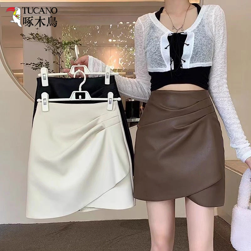 啄木鸟不规则皮裙半身裙女秋冬新款高腰显瘦设计褶皱a字包臀短裙