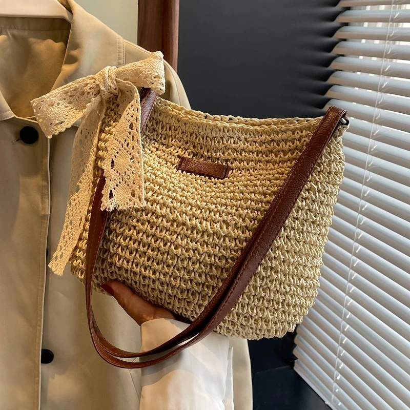 夏季海边度假编织包包女2025新款时尚镂空沙滩包单肩斜挎草编包女