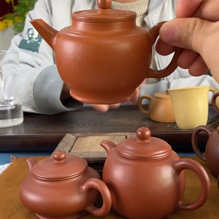 紫砂茶壶朱泥100左右的容量微微瑕
