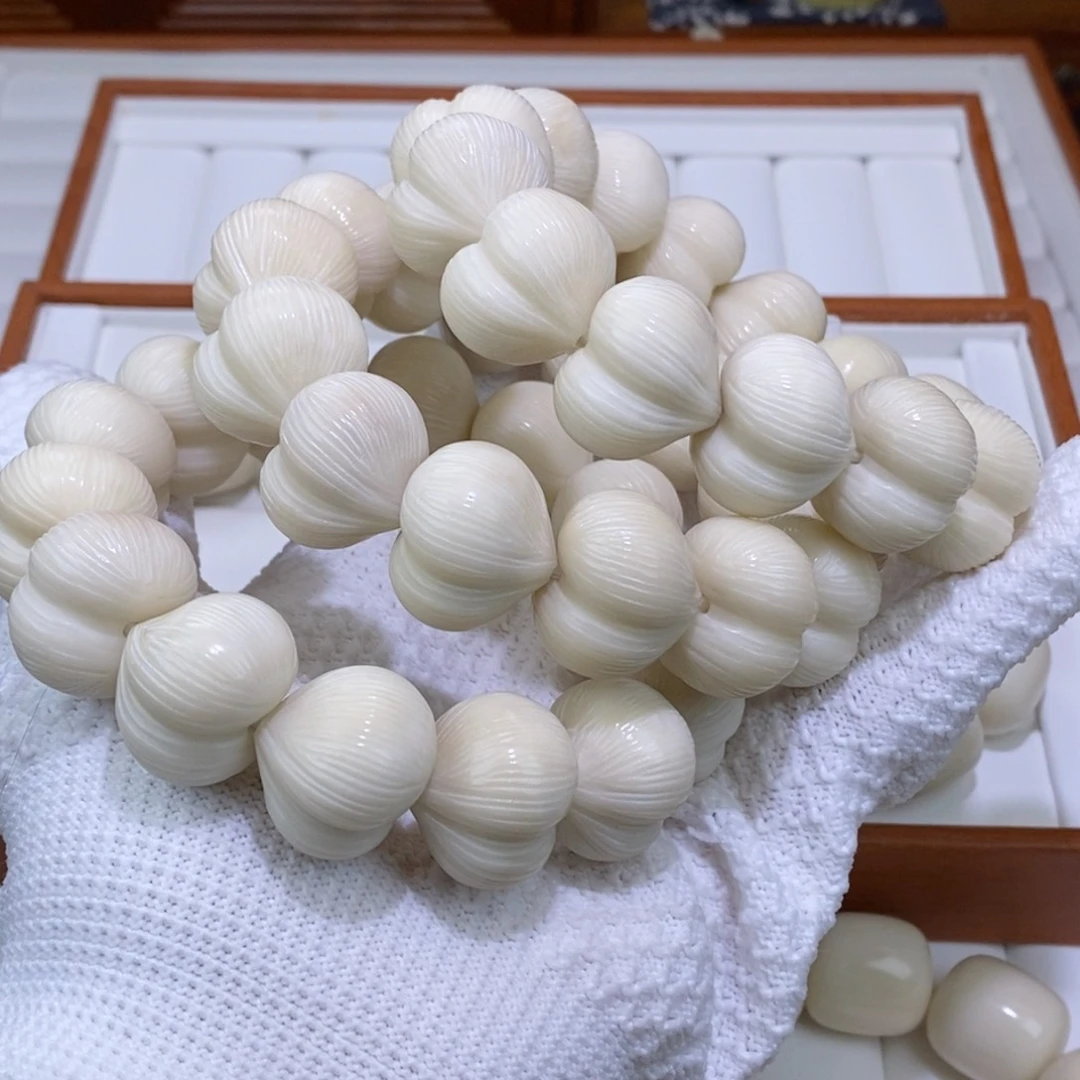 菩提根/象牙果手串微中瑕屁桃牙果雕刻件手串22.23m
