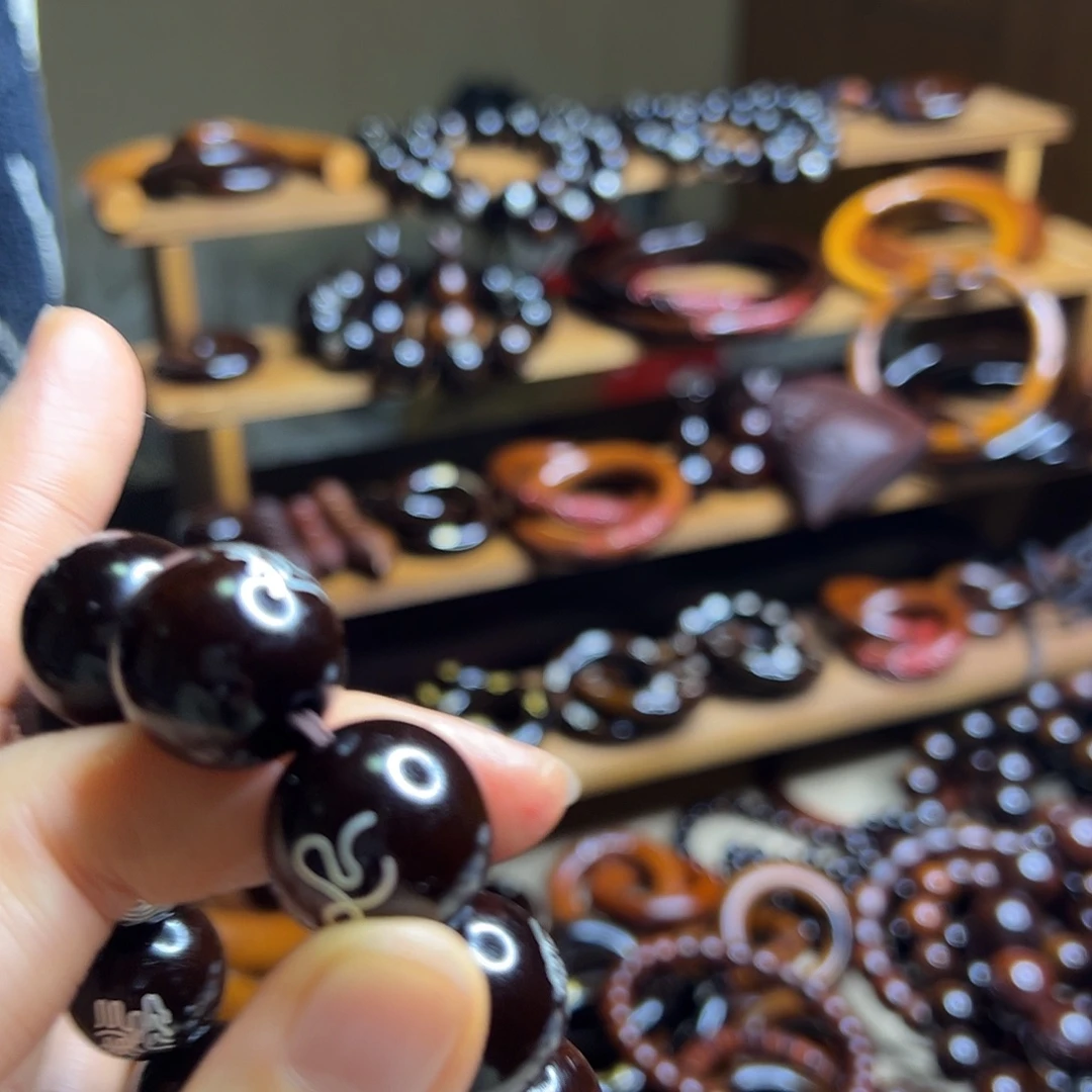 T***r2.0内径枣木玉化镶银珠子