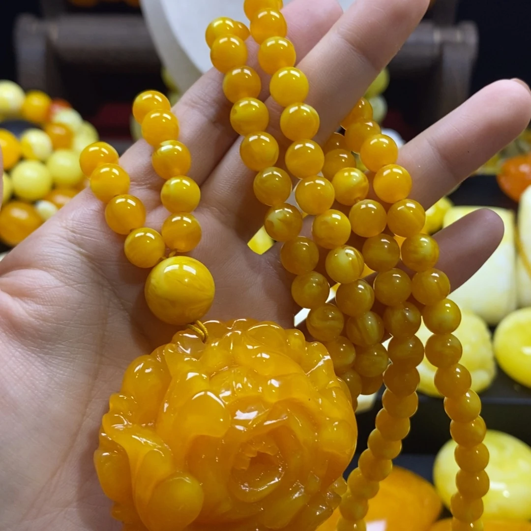 李***子非金属全品无暇精品牡丹吊坠