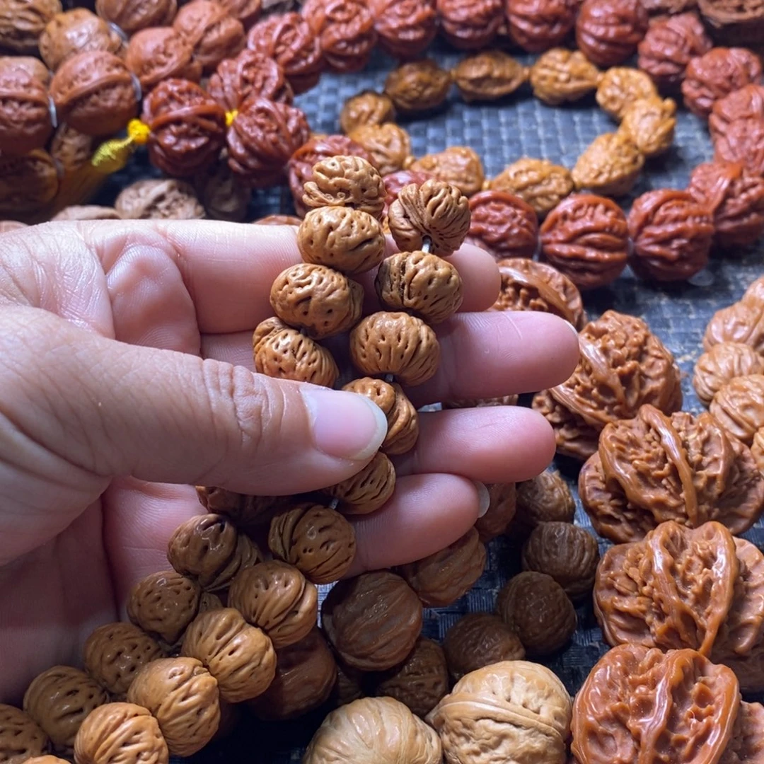 老***樊文玩核桃吊坠蟠桃核脖挂