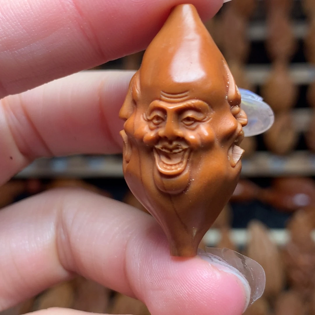 把件橄榄核喜怒哀乐