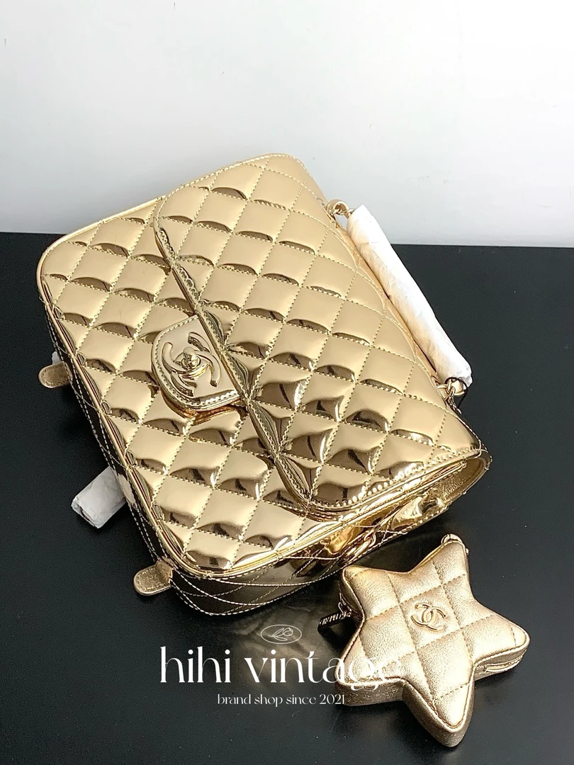 99新 Chanel/香奈儿 金色漆皮菱格纹五角星双肩包芯片底长24CMJL
